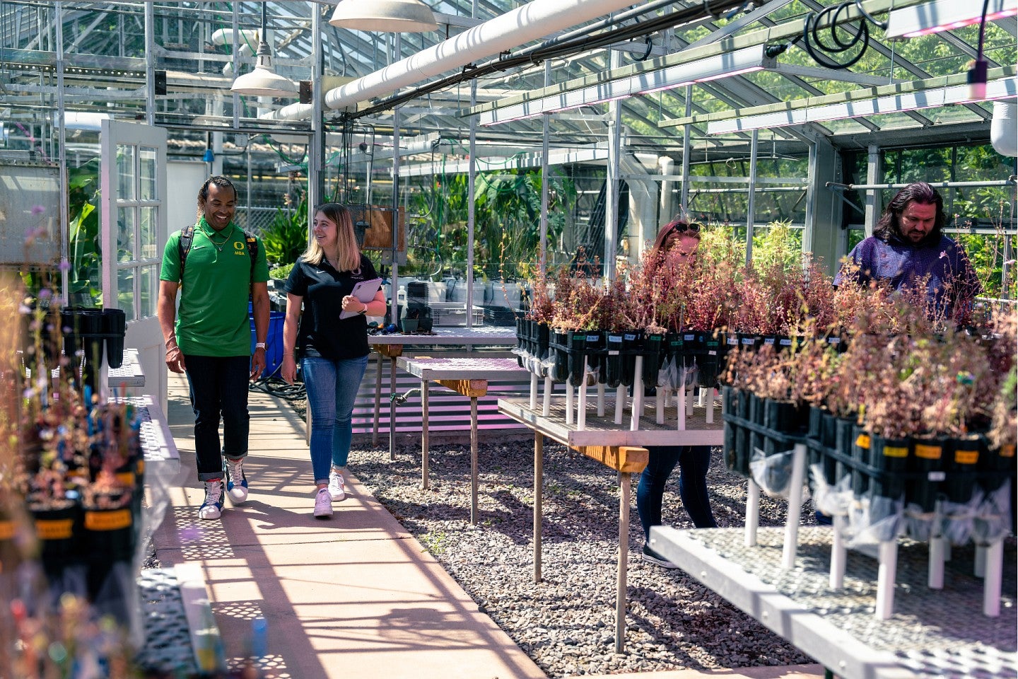 MBA student in greenhouse