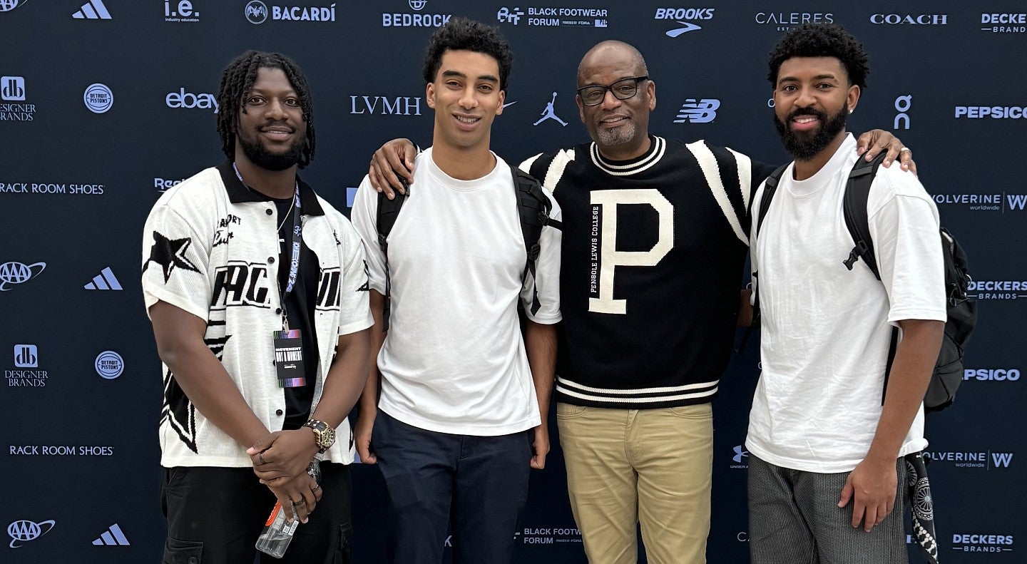 Jalen Niles, Jordan Edmond, and Toluwalase Adedipe with Dr. D'Wayne Edwards, founder of the Black Footwear Forum.