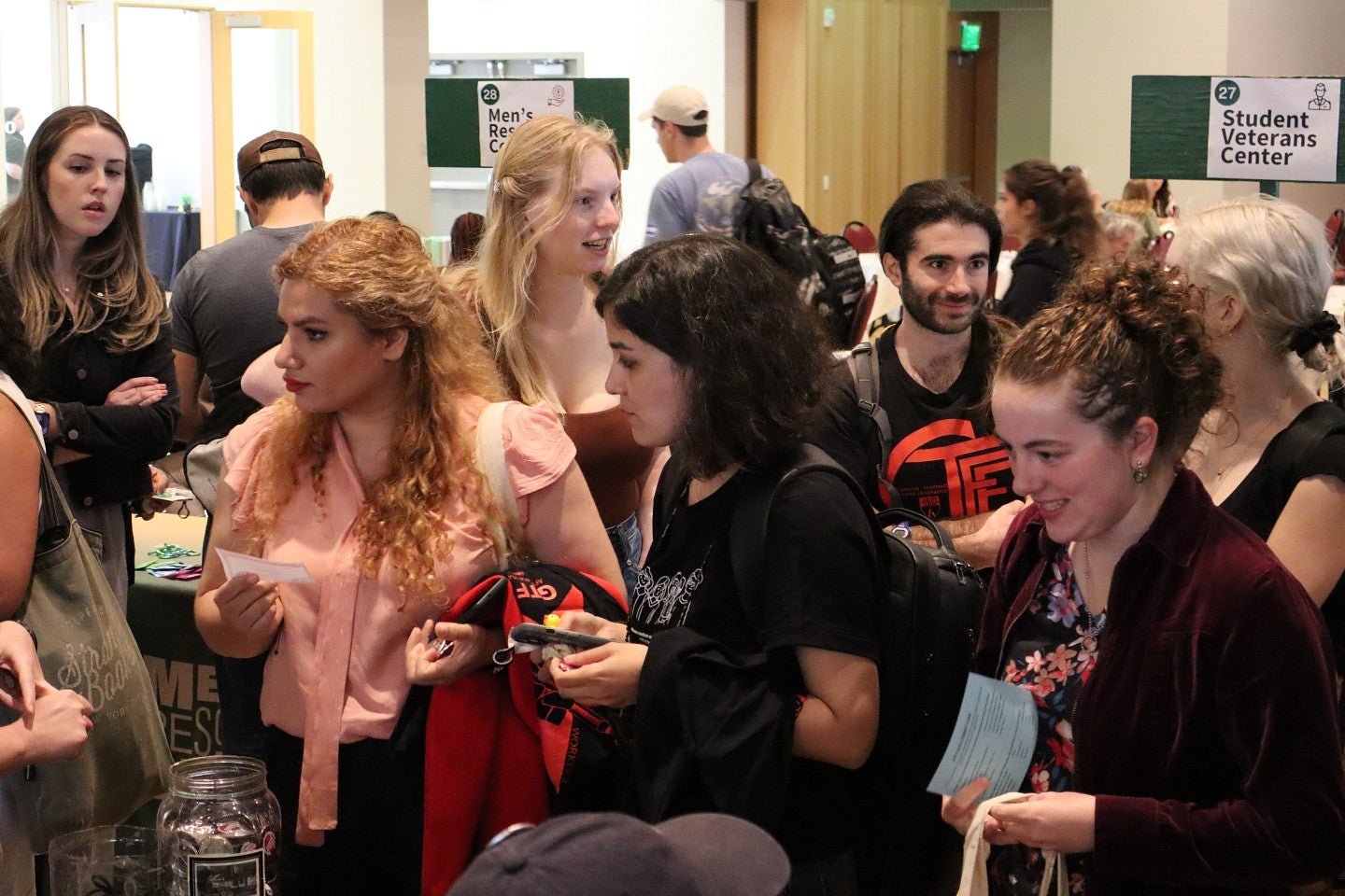 Students collecting resource materials at the 2024 Graduate Welcome Lunch and Resource Fair.