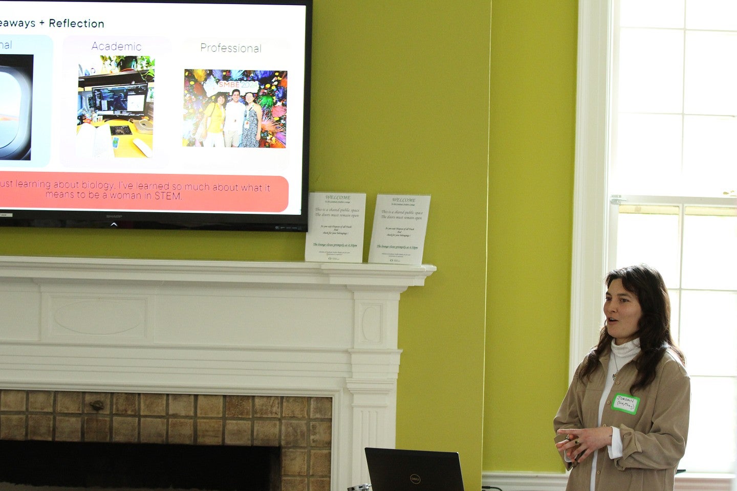 Graduate student speaking to audience 