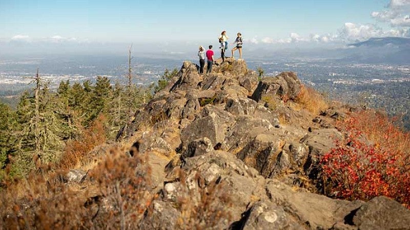 People on top of Spencer Butte overlooking Eugene