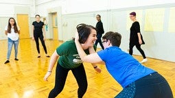 UO students taking a  self defense class