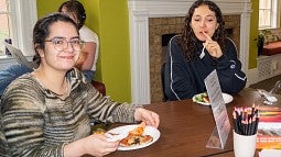 international students having lunch together