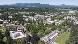 Aerial photo of campus and the Coburg hills
