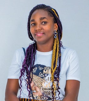 Rhodalyn Tetteh has long braids that are black, gold, and purple.