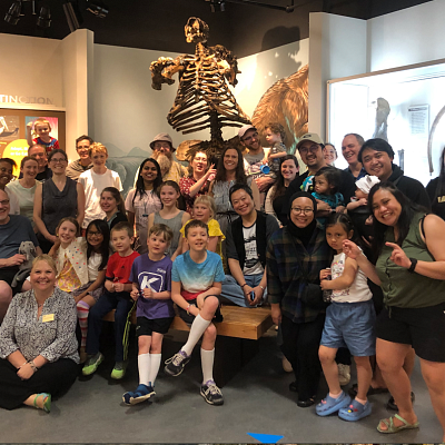 Students with families in the museum