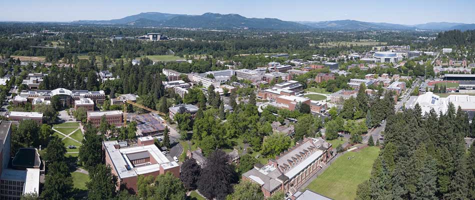 Aerial photo of campus and the Coburg hills